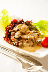 Mushroom saute and white dish