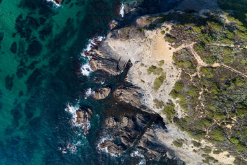 Fototapeta na wymiar Aerial view of the coastline near the Esteveira Beach in Aljezur, Algarve, Portugal
