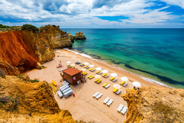 Careanos Beach (Praia dos Careanos) in Portimao, Algarve, Portugal. Concept for travel in Portugal and summer vacations in Portimao, Algarve, Portugal.