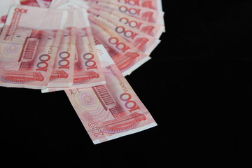yuan on a black background with the space for text