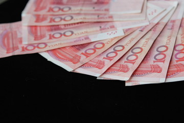 yuan on a black background with the space for text