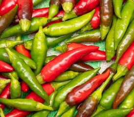 Red and green chili peppers as a background