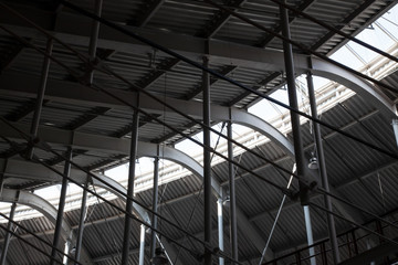 Rounded metal roof of industrial workshop