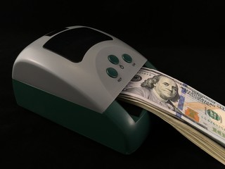 Automatic detector for checking banknotes. Dollars are checked through the device. One hundred...