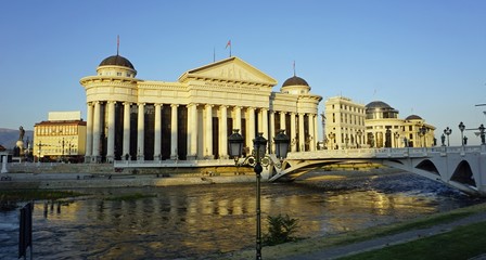 building in skopje at river during autumn