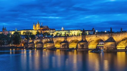 Fototapeta na wymiar View of Prague Castle and Charles Bridge at sunset. Czechia