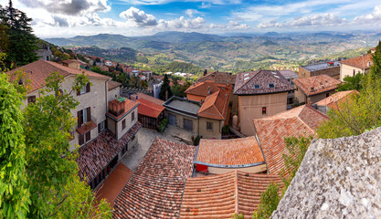Fototapeta na wymiar San Marino. Panoramic aerial view of the valley in the morning.
