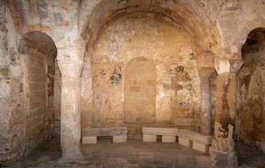Roman archaeological reconstruction, Roman arches and columns at the base of Castro's cathedral. Puglia, Italy.