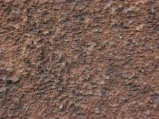 background. texture of old brown, cement plaster. close-up.
