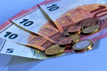 euro banknotes and coins