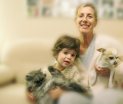 family with pets in home scene