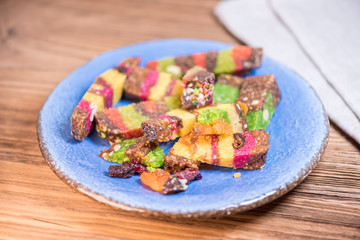 Fresh healthy raw fruitcake from dried fruits and seeds