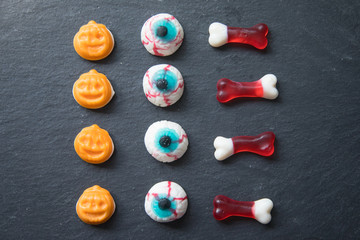 Halloween candies  on black surface
