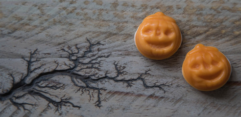 Halloween pumpkins on a wooden surface