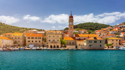 Pucisca is small town on Island of Brac, popular touristic destination on Adriatic sea, Croatia. Pucisca town Island of Brac. Adriatic coast town Pucisca. © daliu