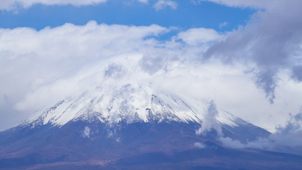 View of the Licancabur volcano covered by clouds, Atacama Desert, Chile