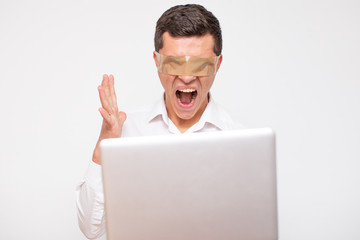 Man working at Computer in his office.