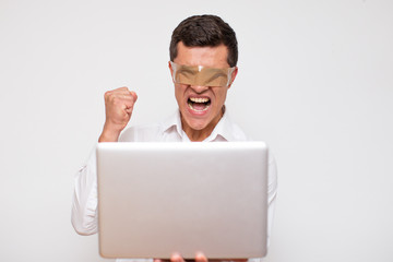 Man working at Computer in his office.