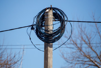 Electric pole against the blue sky