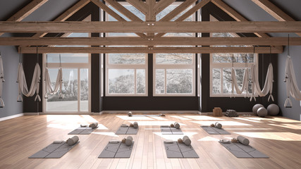 Empty yoga studio interior design, space with hammock, mats, pillows and accessories, wooden floor and roof, ready for yoga practice, meditation, panoramic window with winter panorama - obrazy, fototapety, plakaty