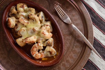 Turkish Casserole Karides Guvec, Shrimp and Mushroom Stew Baked in Clay Dish