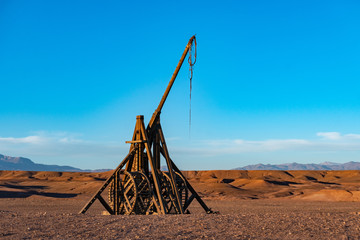 Medieval trebuchet in Sahara desert, Morocco. Atlas Mountains, at Studio polygone