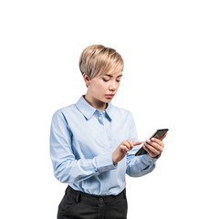 Beautiful young businesswoman using smartphone
