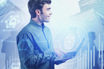 Smiling programmer with laptop, cyber security