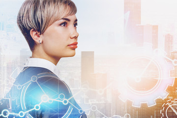 Serious young woman in city, gears and cogs