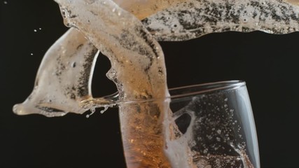 Beer pouring and splashing in super slow motion.  Shot on Phantom Flex 4K high speed camera. 