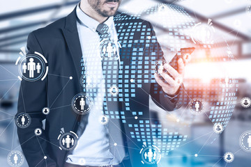 Businessman with smartphone, HR interface