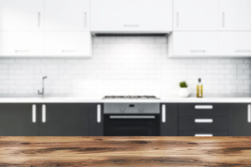 Blurry white brick kitchen with gray countertops