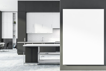 Gray and white brick kitchen with poster