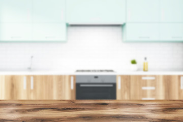 Blurry white brick kitchen with wooden countertops