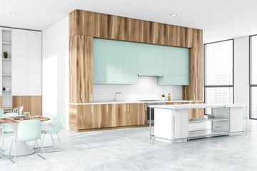 Wood and white brick kitchen with table and bar