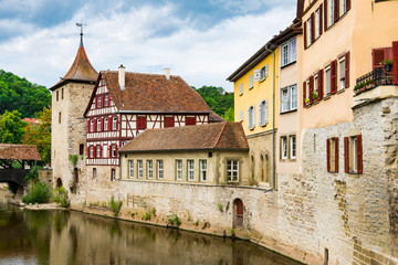 Fototapeta na wymiar Half timbered houses and Sulfer tower along river Kocher in Schwabisch Hall, Germany