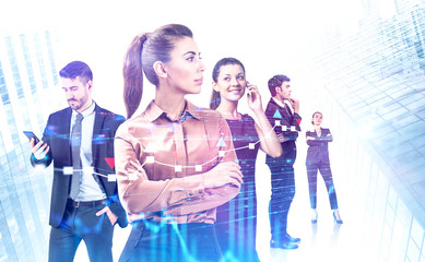 Confident young business team in city, graphs