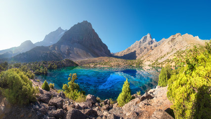 Beautiful mountains summer landscape. Alaudin lake in Fann mountains, Tajikistan. Turquoise clear...