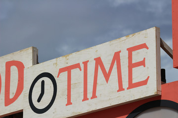 A sign board that conveys the importance of time