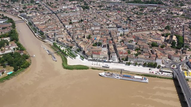 Panoramic aerial view of Libourne city on Dordogne river on sunny summer day, Gironde, France