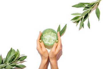 Flat lay woman's hands holding jar