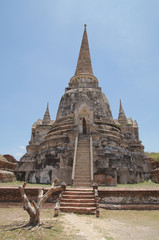 Asian religious architecture. Ancient pagoda at Wat Phra Sri Sanphet temple under blue sky. Ayutthaya, Thailand