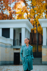 Fototapeta premium The girl walks in autumn