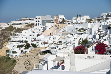 Fototapeta premium white houses of the mediterranean on the rocks against the sea