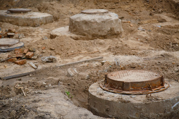 construction site, installation of manhole