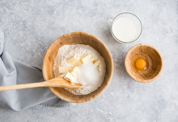 Baking concept, baking ingredients on background. Ingredients for baking cake, cookies, bread or pastry. Frame of cooking kitchen utensils and food