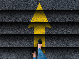  woman legs in shoes climbing stairs with arrow. business. success or progress concept - obrazy, fototapety, plakaty