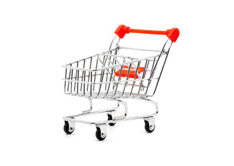 Empty grocery shopping cart with red handle isolated on white background.