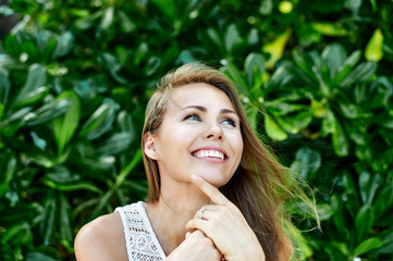 Have an idea! Delightful beautiful smiling woman looking at something