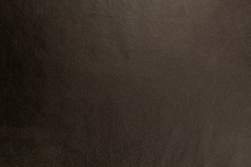 Black eco-leather close-up. Skin texture